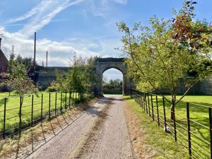 Entrance drive & archway- click for photo gallery